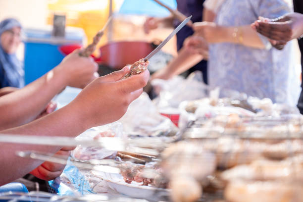 istock Female only helping each other during their vacation also with preparing barbecue 2151098234
