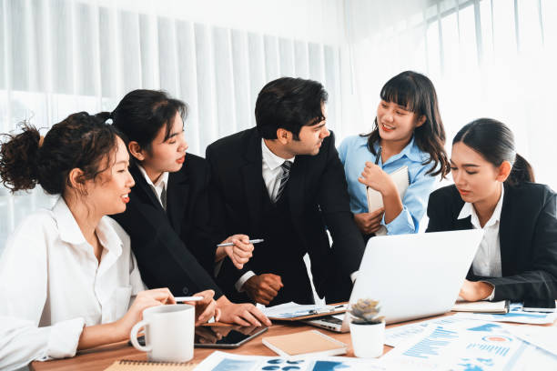istock Group of business analyst team analyzing financial data report. Habiliment 2151100255
