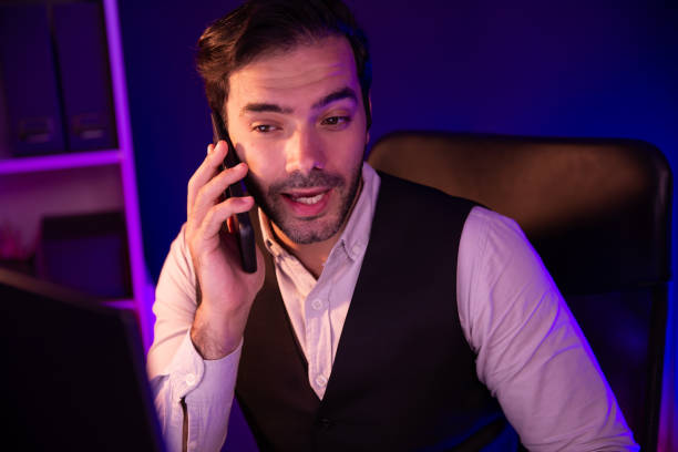 istock Smart businessman calling partner smartphone discussing target market. Surmise. 2151105293