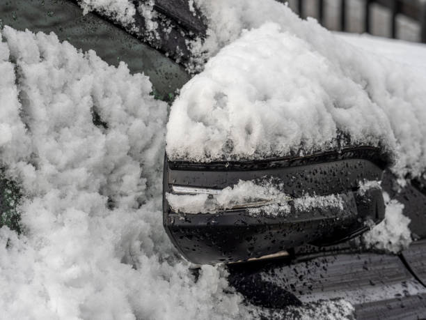 istock Car Covered in Snow on April Street 2151108867