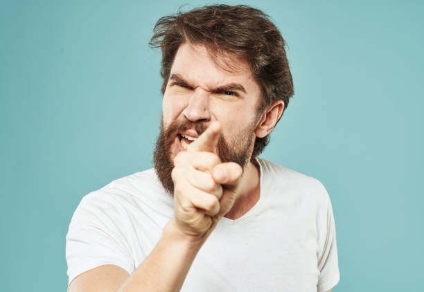 istock Emotions man model blue background white t-shirt cropped view 2151108955