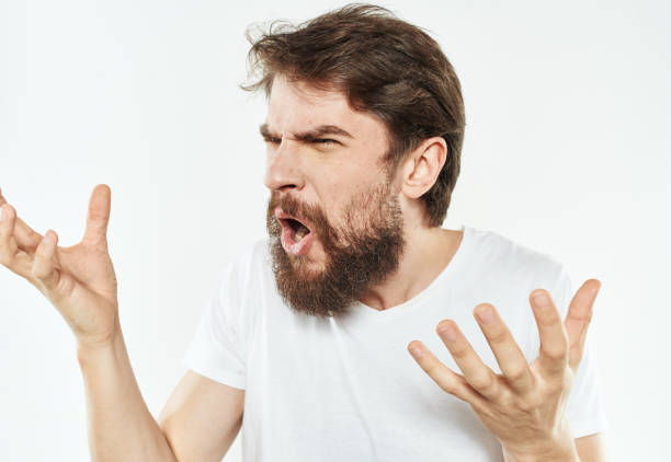 istock Young man in white t-shirt emotions model gesturing with hands 2151109206