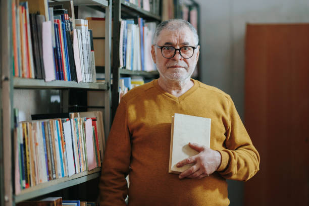 istock At the Bookstore Senior Man Selecting Books from Shelves 2151110783