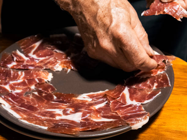 istock Artisanal Jamon Slicing for Gourmet Cuisine 2151112863