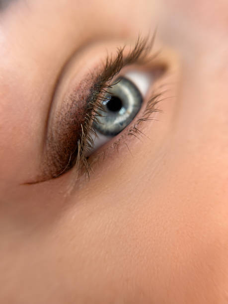 istock permanent make up , close up woman eye beautiful 2151113094