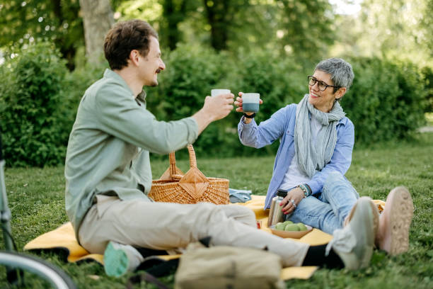Man and a woman on a picnic in a public park