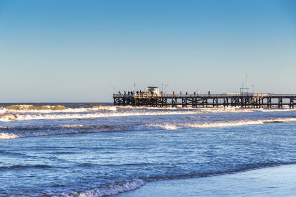 La Lucila del Mar, Buenos Aires, Argentina - January 12, 2022: View of the famous fishing pier. Day of summer in January vacations.