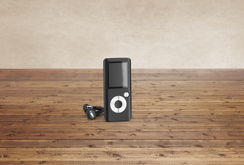 Retro MP3 player on a wood background