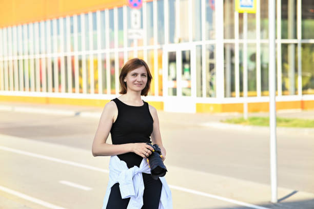 Female photographer taking pictures in the streets of Old Town, Kaleici Antalya