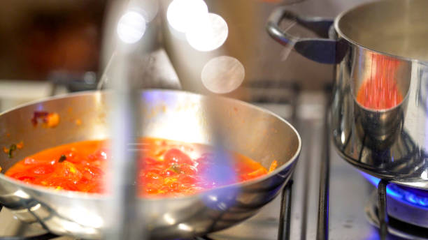 istock Professional chef cooking in domestic kitchen: Preparing proper 