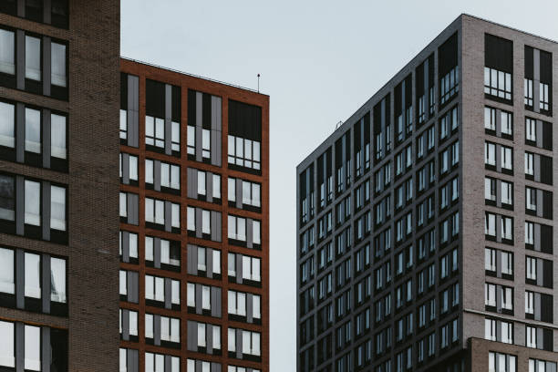 istock Residential building facade and windows. Modern urban architecture pattern 2151121854