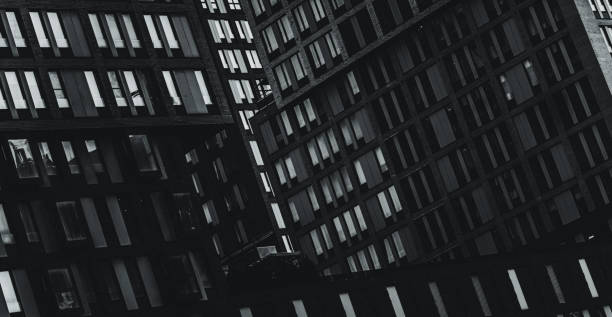 istock Building facades and windows patter. Artistic black and white photo 2151121948