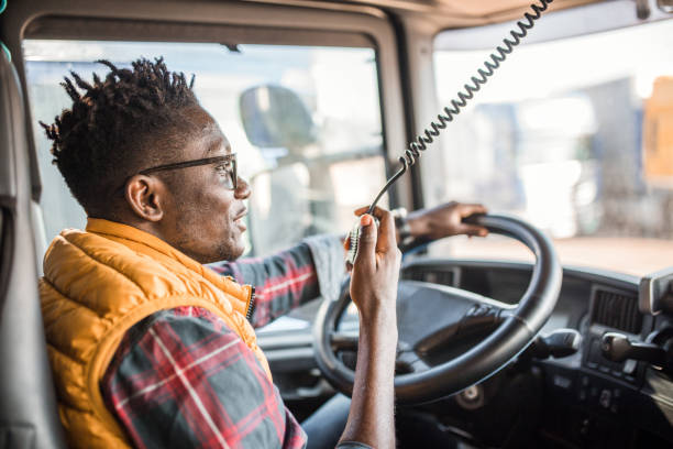 istock Cheerful male truck driver CB talking 2151126778