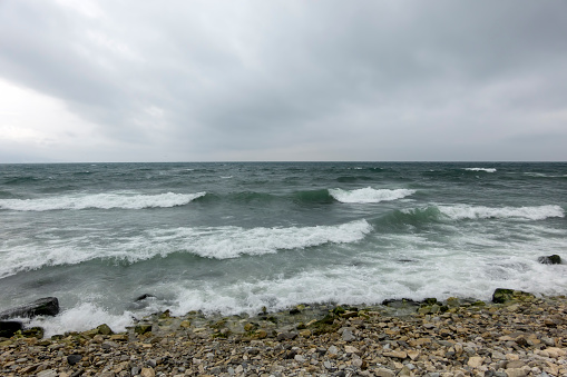 View of a stormy seascape of waves and the Black Sea.