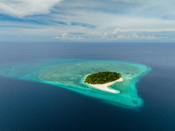 istock Tropical Island in Camiguin, Philippines. Mantigue Island. 2151126880