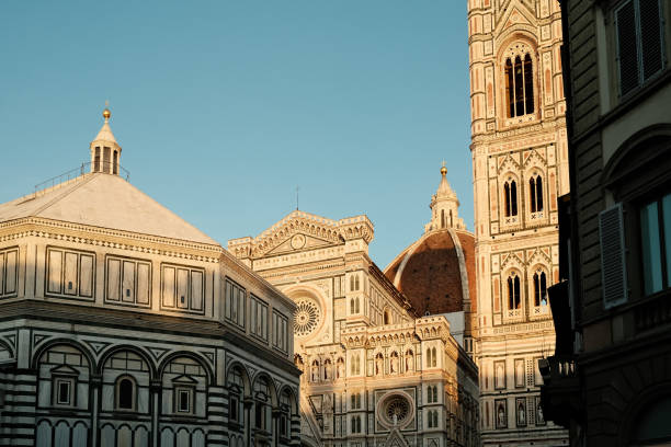 Florence Santa Maria del Fiore Cathedral at sunset. Cupolone, Baptistery and Giotto's Bell tower in Florence, Italy.