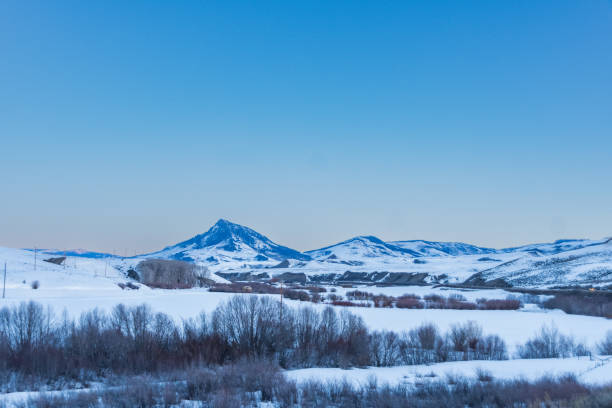 A snow-covered mountain peak in the Sangre de Christo Mountain range in the San Luis Valley region of Southern Colorado.