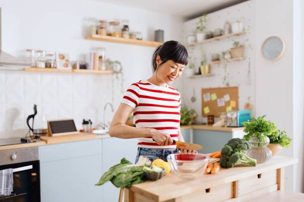 istock Woman preparing vegan food 2151129528