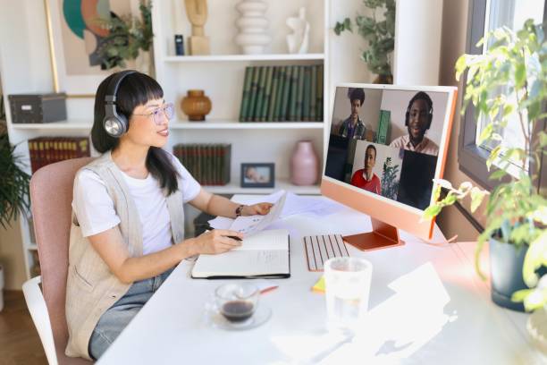 istock Female person having a video call with her colleagues 2151131302
