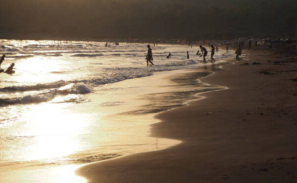 istock Silhouettes in the beach 2151132766