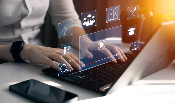 istock E-learning education, internet lessons and online webinar. Person who attends online lessons on a digital screen.Education internet Technology. 2151135604