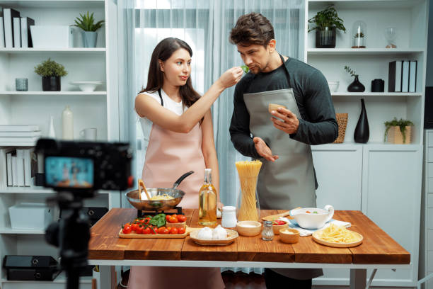 istock Influencers on cooking show presenting ingredient of spaghetti dish. Postulate. 2151135721