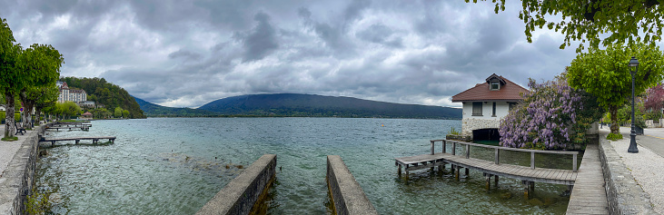 Annecy, Haute-Savoie, France: cloudy day, view of Annecy lake, the second largest in France, known for being the cleanest in Europe due to strict environmental regulations in place since the 1960s