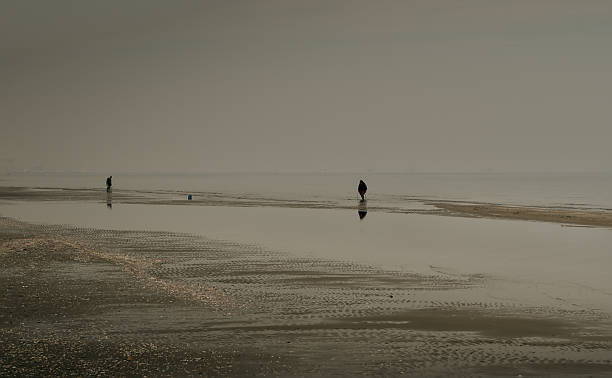 istock Lonely people on the Adriatic beach 2151139828