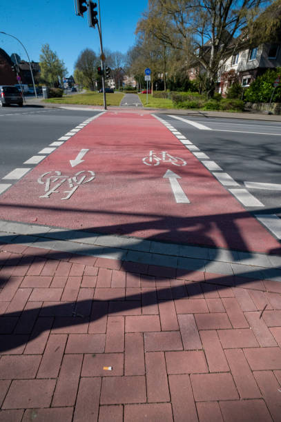 istock bicycle lane sign on the road 2151141836