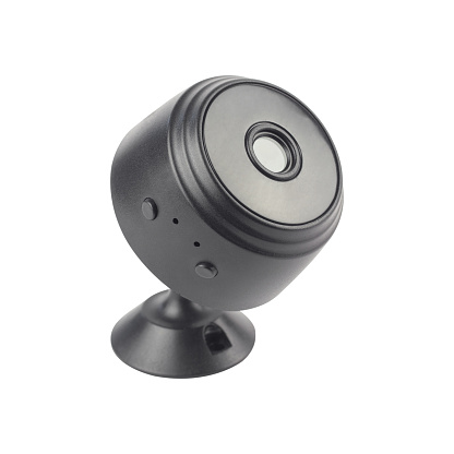 Mini wifi security camera on tripod isolated from background