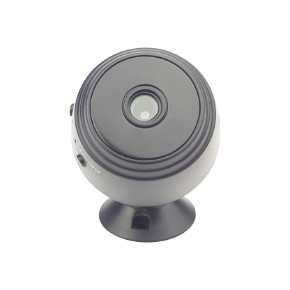 Mini wifi security camera on tripod isolated from background