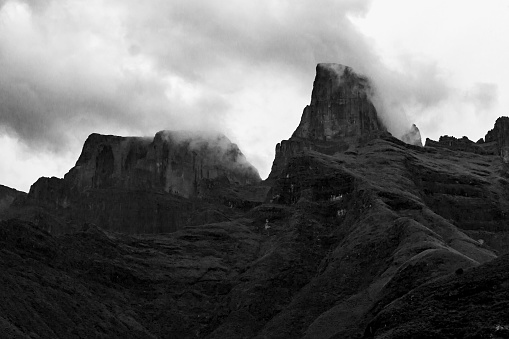 These iconic cliffs and peaks of the Drakensberg Mountains formed due to the combination of the Jurassic period large flood basalt during the break-up of the Gondwana Supercontinent and erosion from the later uplift of the African Continent.