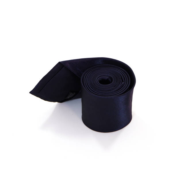 istock Single plain black necktie rolled on white background close-up view, Single object, No people 2151145092