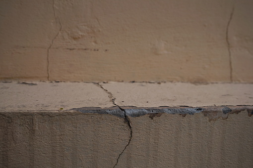 A crack in the wall that runs on different planes.