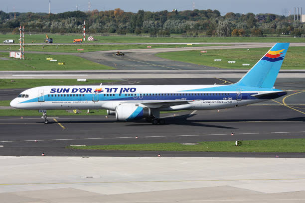 Dusseldorf, Germany - October 9, 2010: Israeli Sun D’or Boeing 757-200 with registration 4X-EBS on taxiway at Dusseldorf Airport