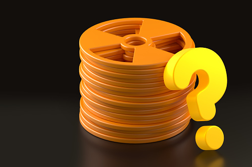 A Stack of Nuclear Symbol and a Neon-Lit Question Mark on a Black Background. 3d Rendering