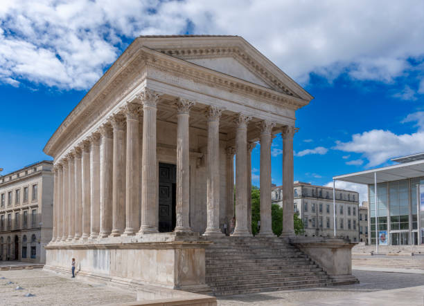 istock Nîmes, France - 04 17 2024: Square House. View of the white monument 2151155695