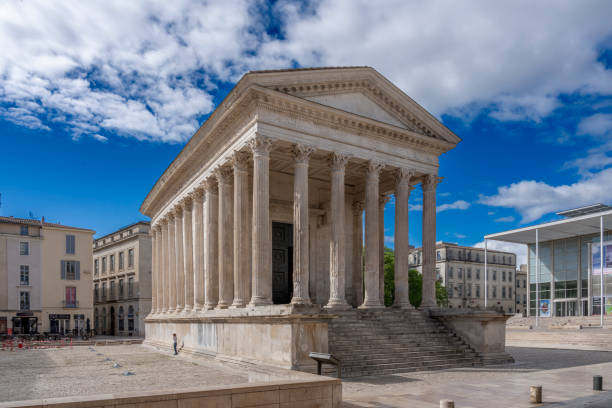 istock Nîmes, France - 04 17 2024: Square House. View of the white monument 2151155715
