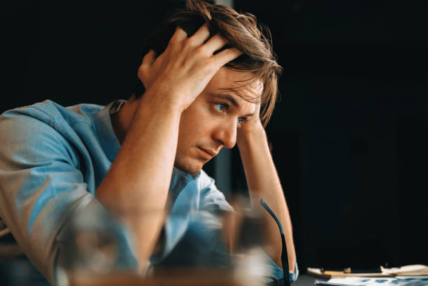 istock Thinking of stressful financial analyst researching on business. Pecuniary. 2151158904
