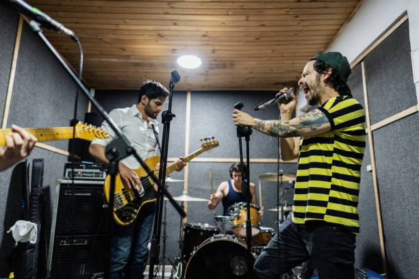 istock Rock band rehearsing in the recording studio 2151160188