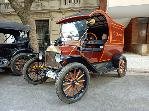 Buenos Aires, Argentina - May 13, 2023: Old red 1916 Ford Model T delivery van in the street at an antique car show. Recoleta - Tigre Grand Prix.