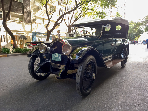 Buenos Aires, Argentina - May 13, 2023: Old 1910s Oldsmobile luxury phaeton in the street at an antique car show. Recoleta - Tigre Grand Prix.