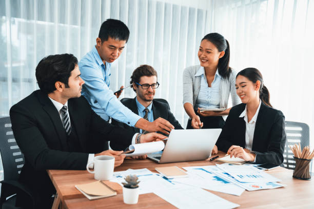 istock Group of business analyst team analyzing financial data report. Habiliment 2151160272