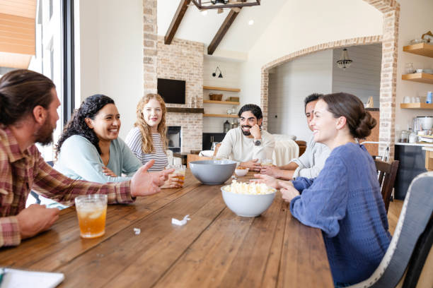 Young adults smile and talk about their college experiences