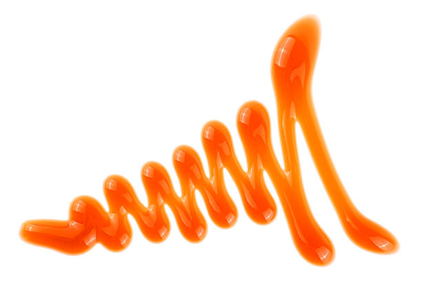 istock Caramel sauce isolated on a white background, top view. Caramel topping. 2151161622