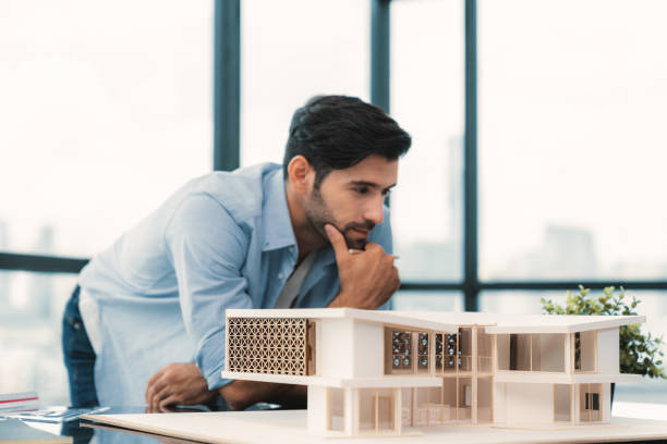 istock Smart civil engineer looking while planing design house construction. Tracery. 2151163825