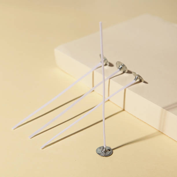 istock Candle Wicks on Beige background. Making homemade candle 2151170804