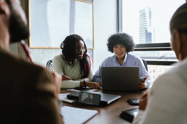 istock Coworkers working using laptop at the office 2151172169