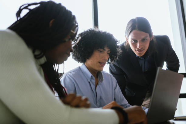 istock Coworkers working using laptop at the office 2151172184