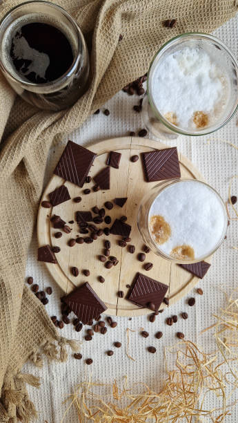 istock Different types of coffee with dark chocolate and coffee beans. Flat lay composition. 2151173215
